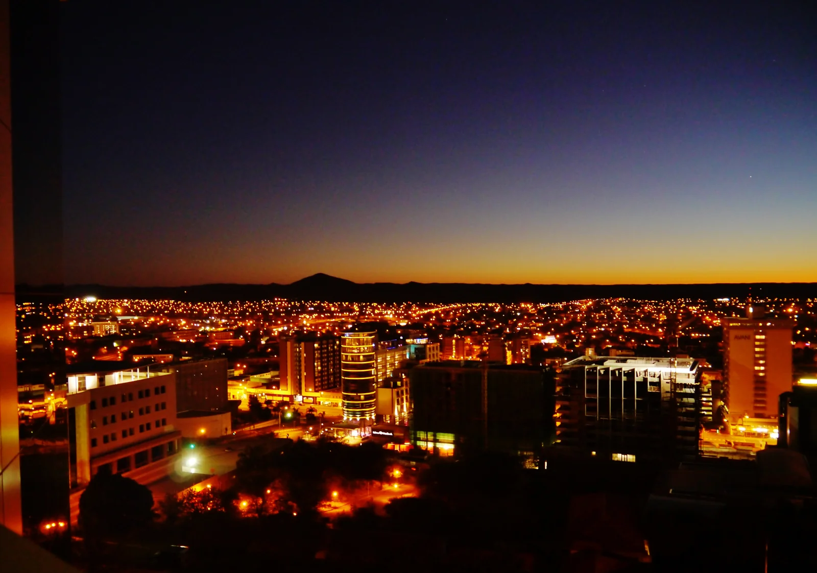Windhoek after sunset, viewed from the Independence Memorial Museum in 2017.